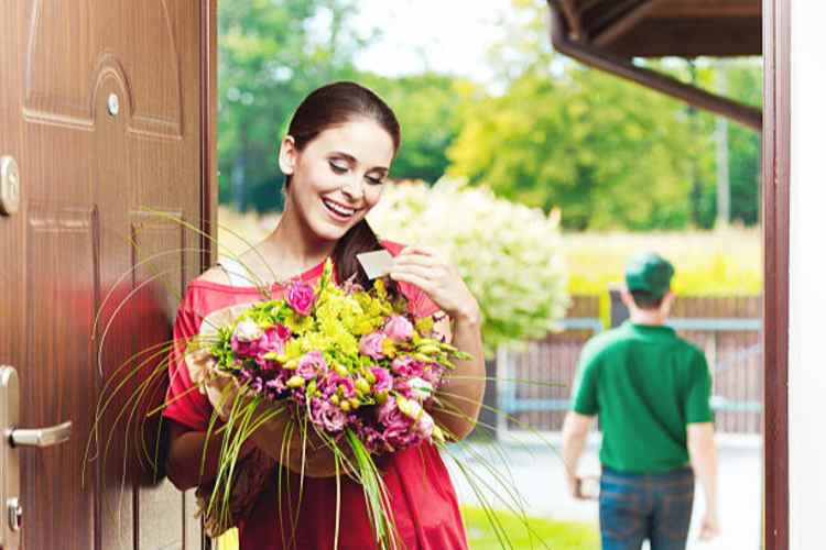 woman receiving flowers
